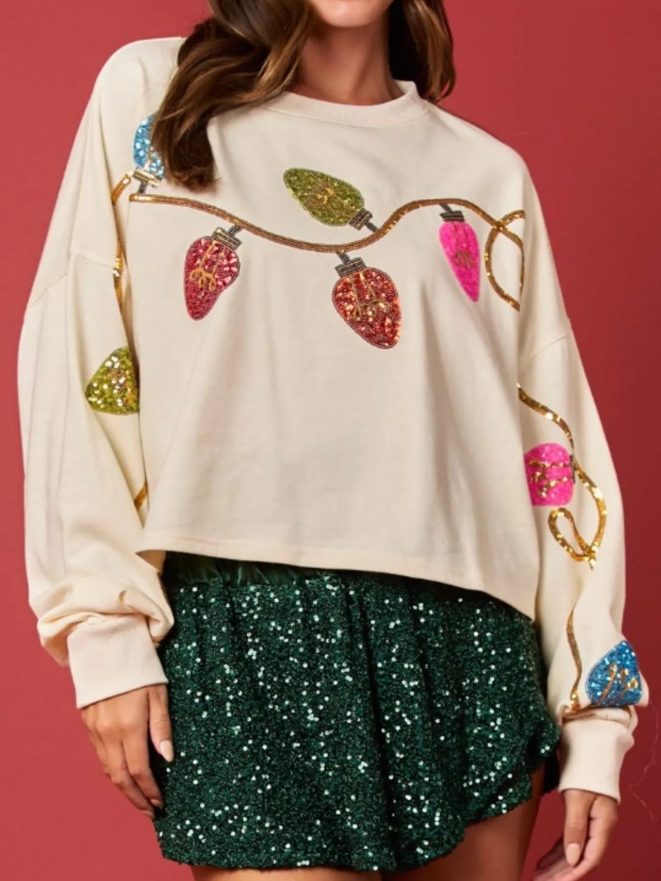 Sequin embellished polyester sweatshirt with long sleeves and a relaxed fit for holidays