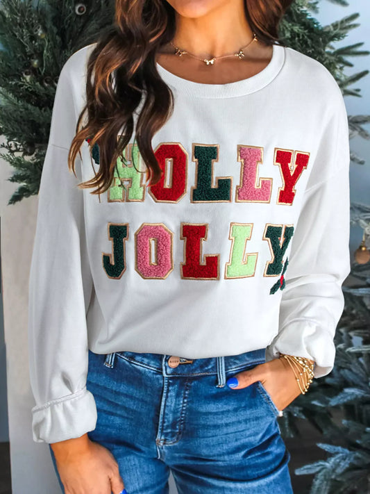 Light gray sweatshirt with round neck and festive embroidered design.