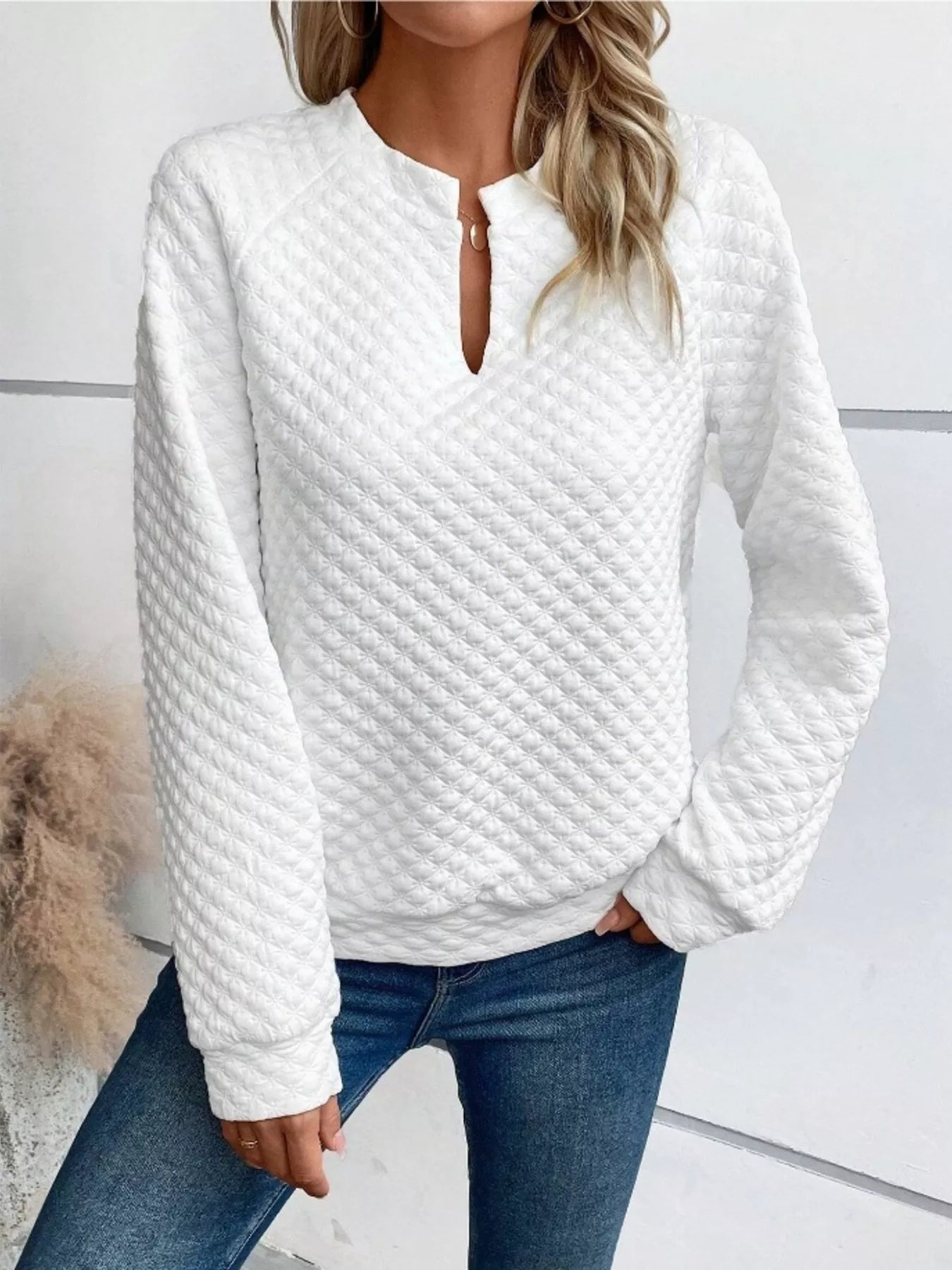 Textured sweatshirt with notched raglan sleeves in a basic style and no stretch fabric