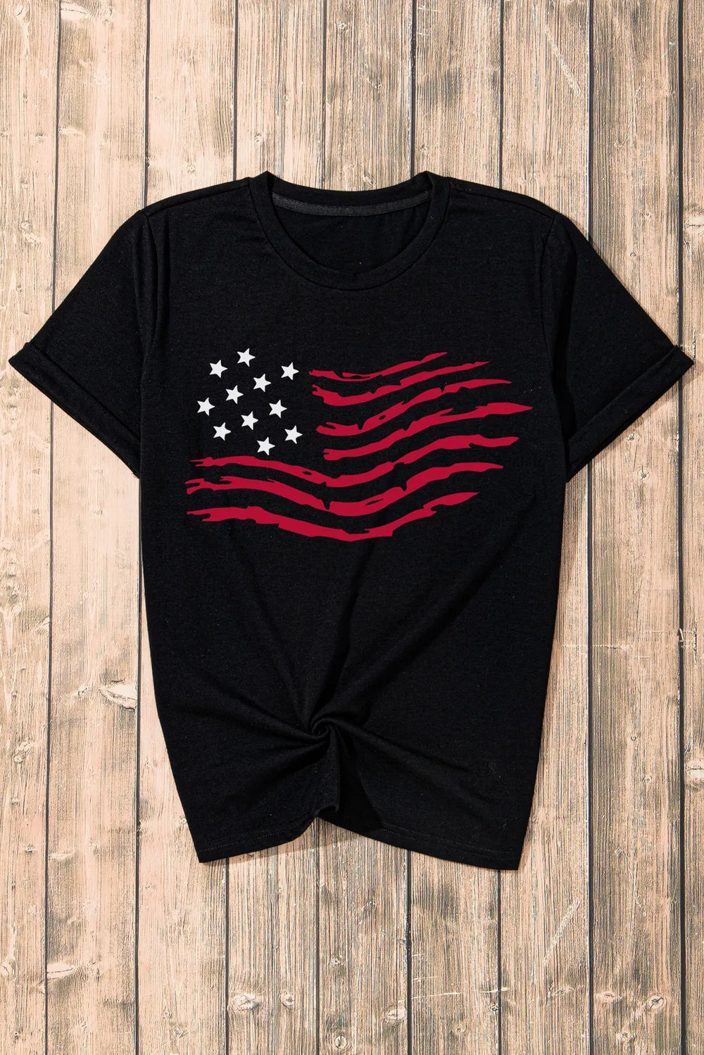 Short sleeve US flag t-shirt with round neck in polyester blend fabric.