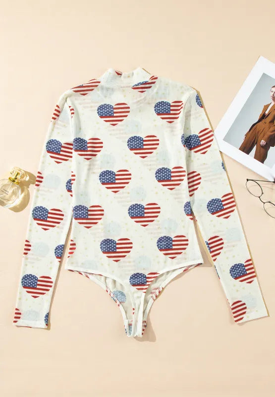 Sheer long sleeve bodysuit with US flag heart design and slightly stretchy fabric.