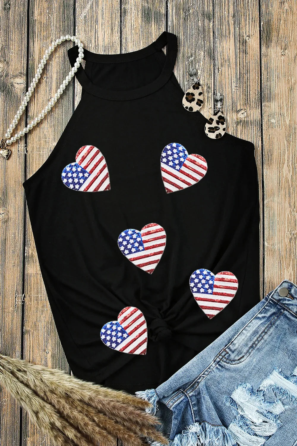 Sheer tank top with sequin heart design and US flag pattern, made of stretchy fabric.