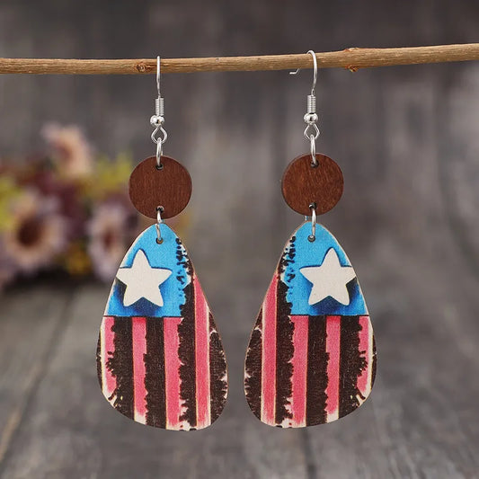 Wooden dangle earrings featuring a star and stripes design in alloy and wood materials.