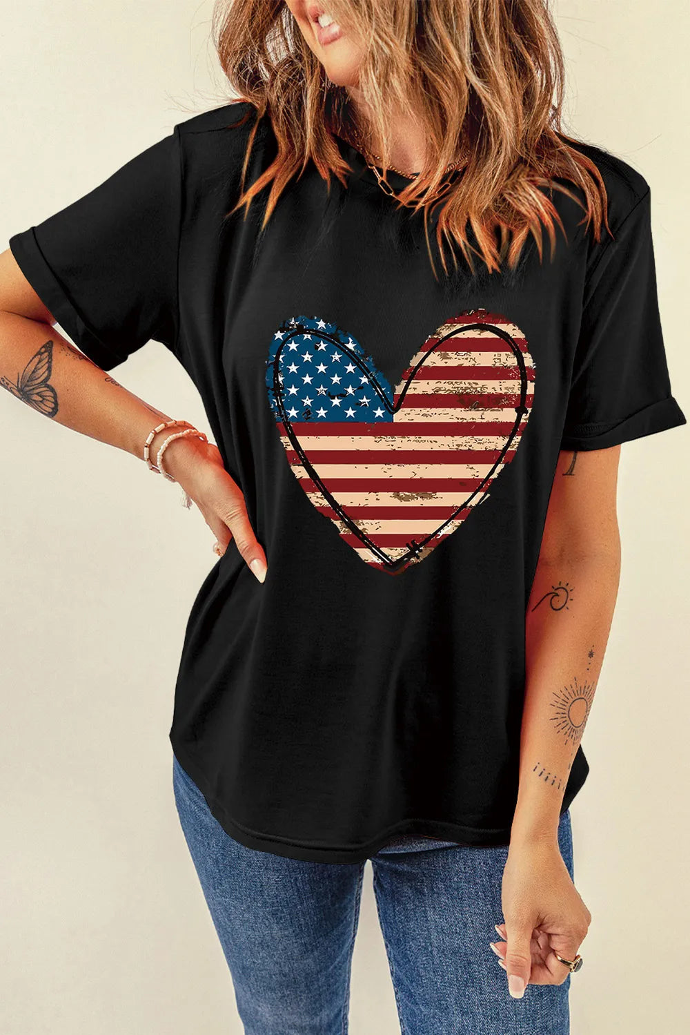 Cotton blend short sleeve T-shirt with a stars and stripes heart design.