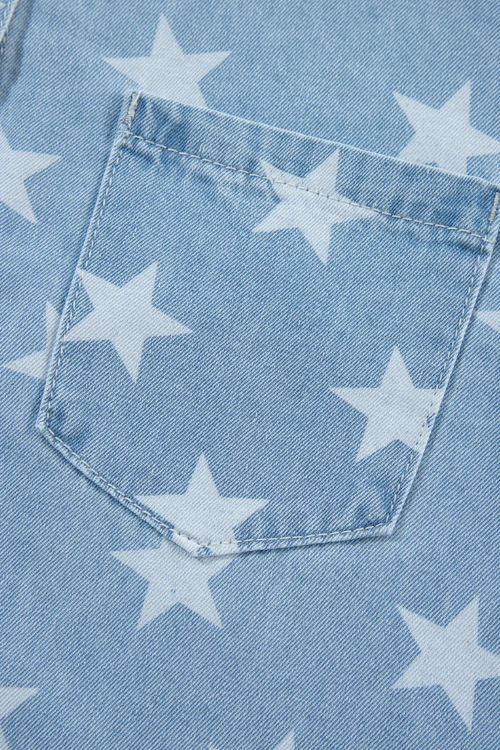 Raw hem denim top with a star collar, made from a cotton blend fabric.