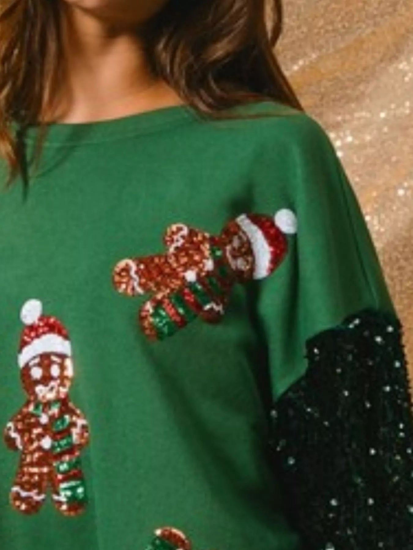 Long sleeve sweatshirt with sequins, designed for comfort and festive style.