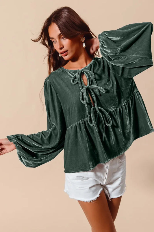 Emerald green velvet peasant blouse with tie-front neckline and balloon sleeves.