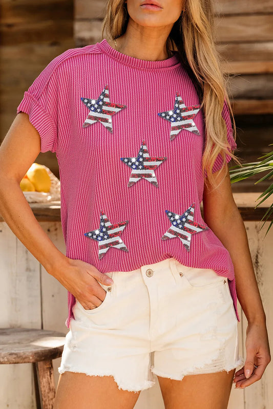 Sheer sequin top with exposed seams and a round neck, short sleeves, and a relaxed fit.