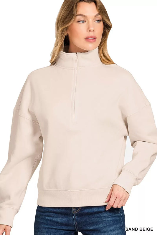 Sand beige half-zip sweatshirt with high neck collar and ribbed cuffs for a relaxed fit.