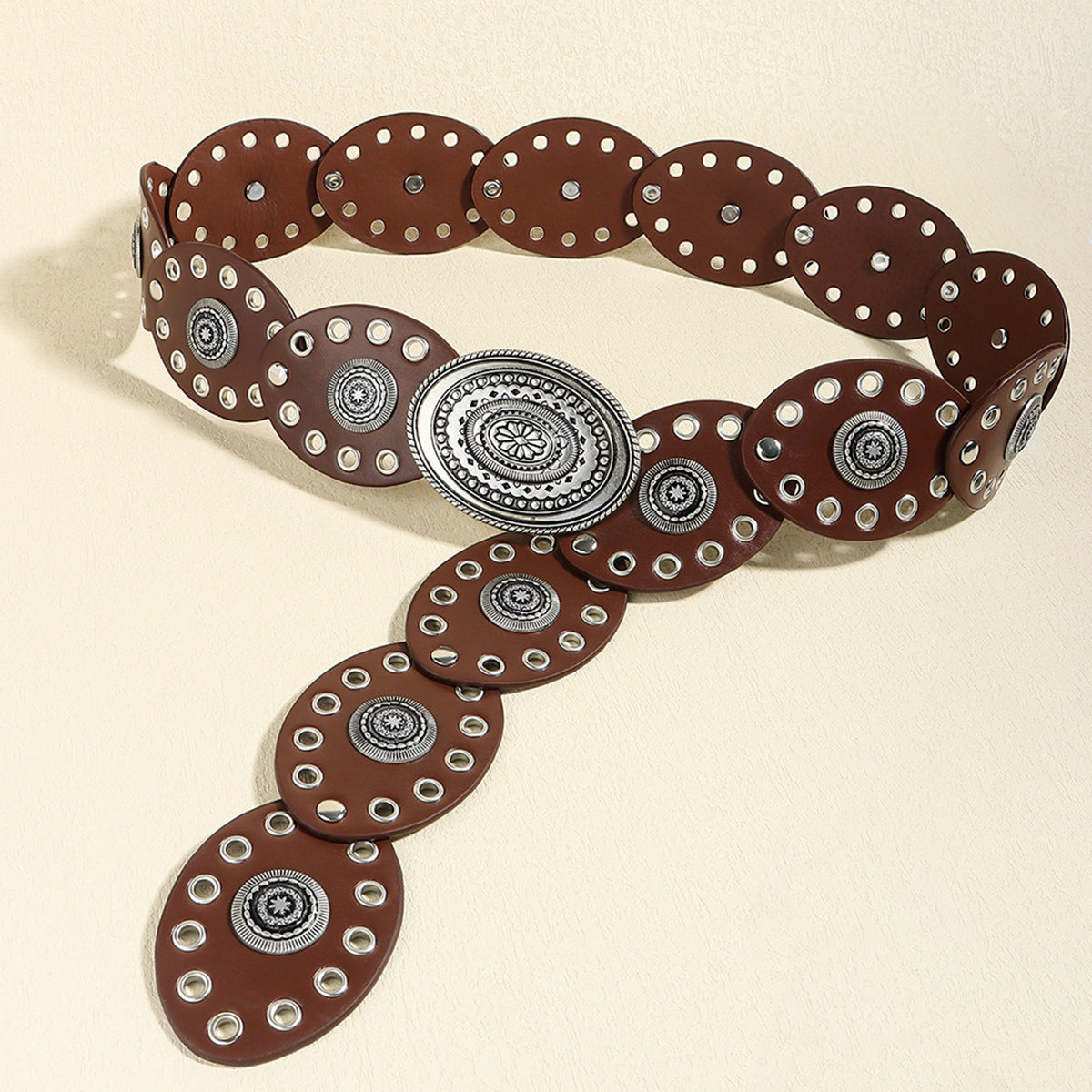 Brown oval PU leather belt with silver decorative discs and buckle.
