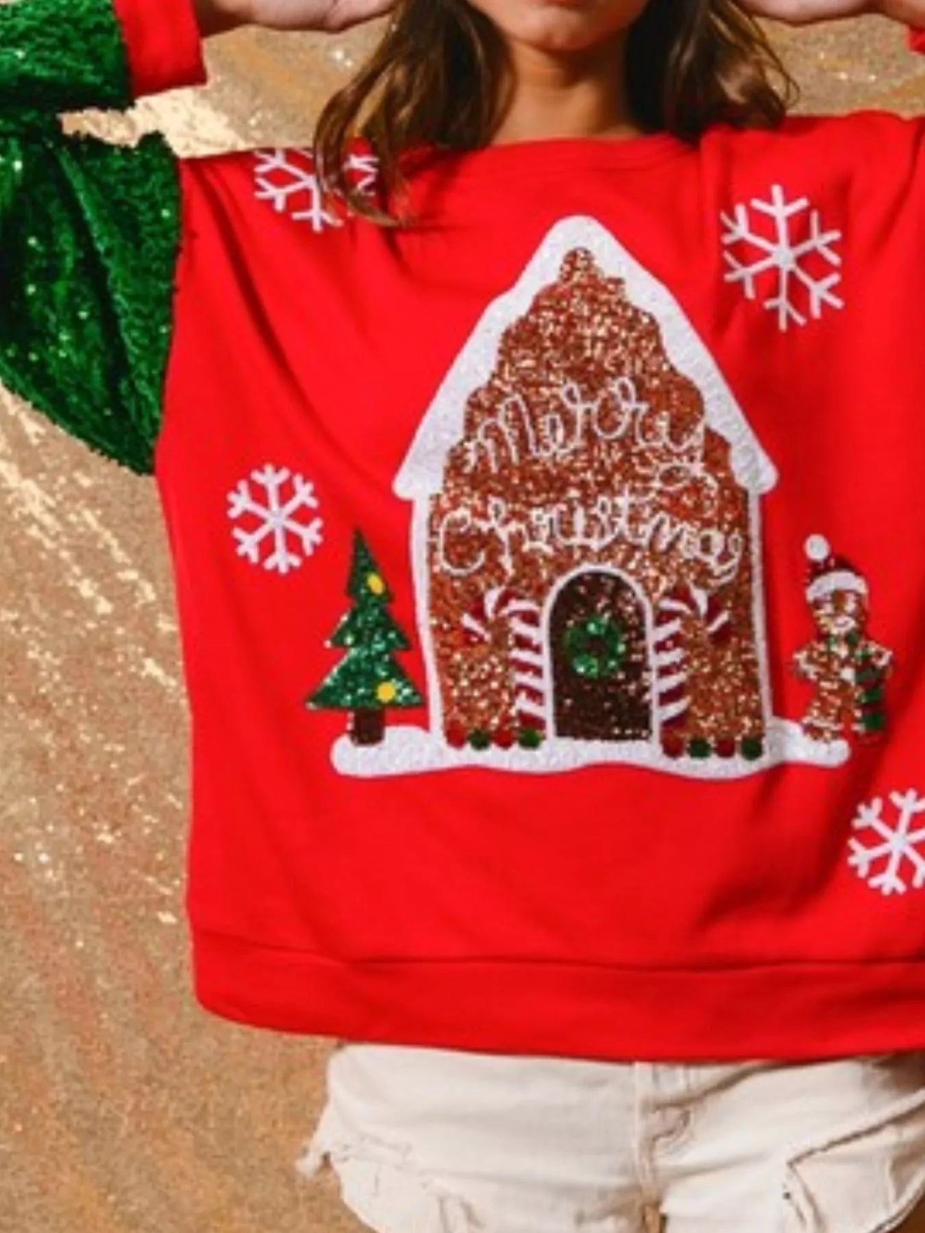 Long sleeve sweatshirt with subtle sequins and a comfortable fit for holiday wear.