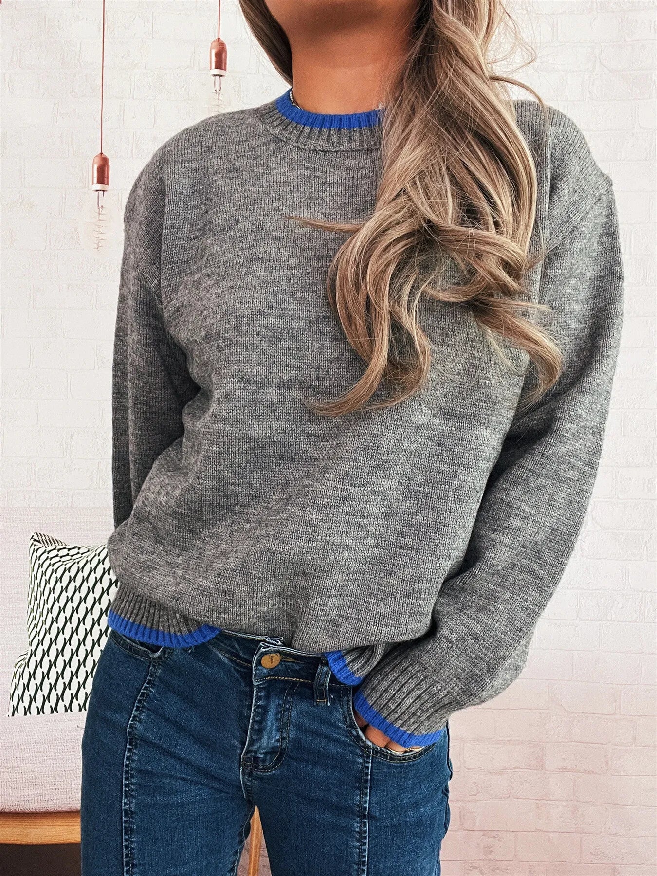 Ribbed long sleeve sweater with contrast trim in black polyester fabric