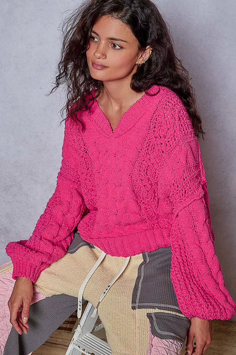 Chenille cable-knit V-neck cropped sweater in pink with balloon sleeves.