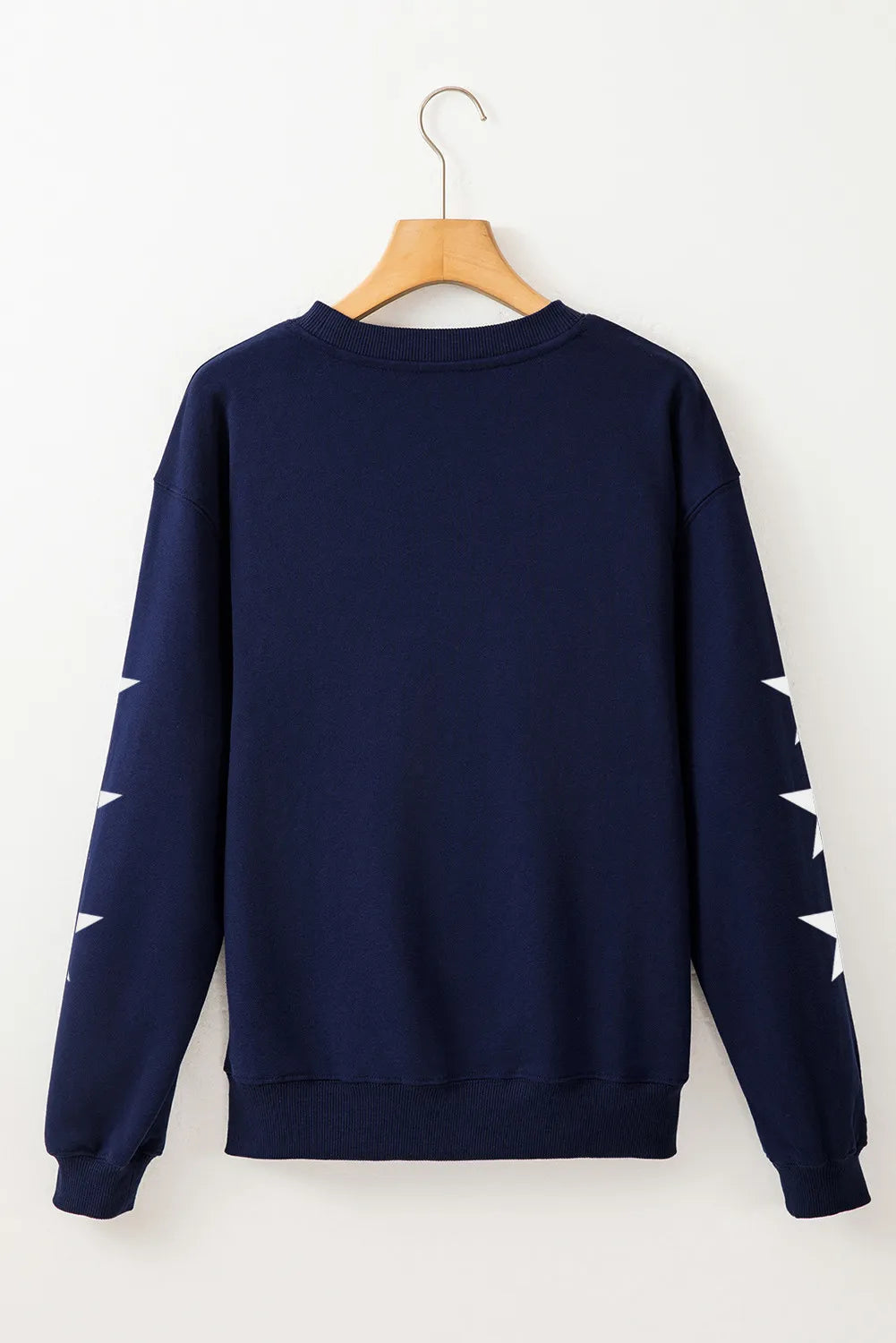 Long sleeve cotton blend sweatshirt with glitter star design and opaque fabric