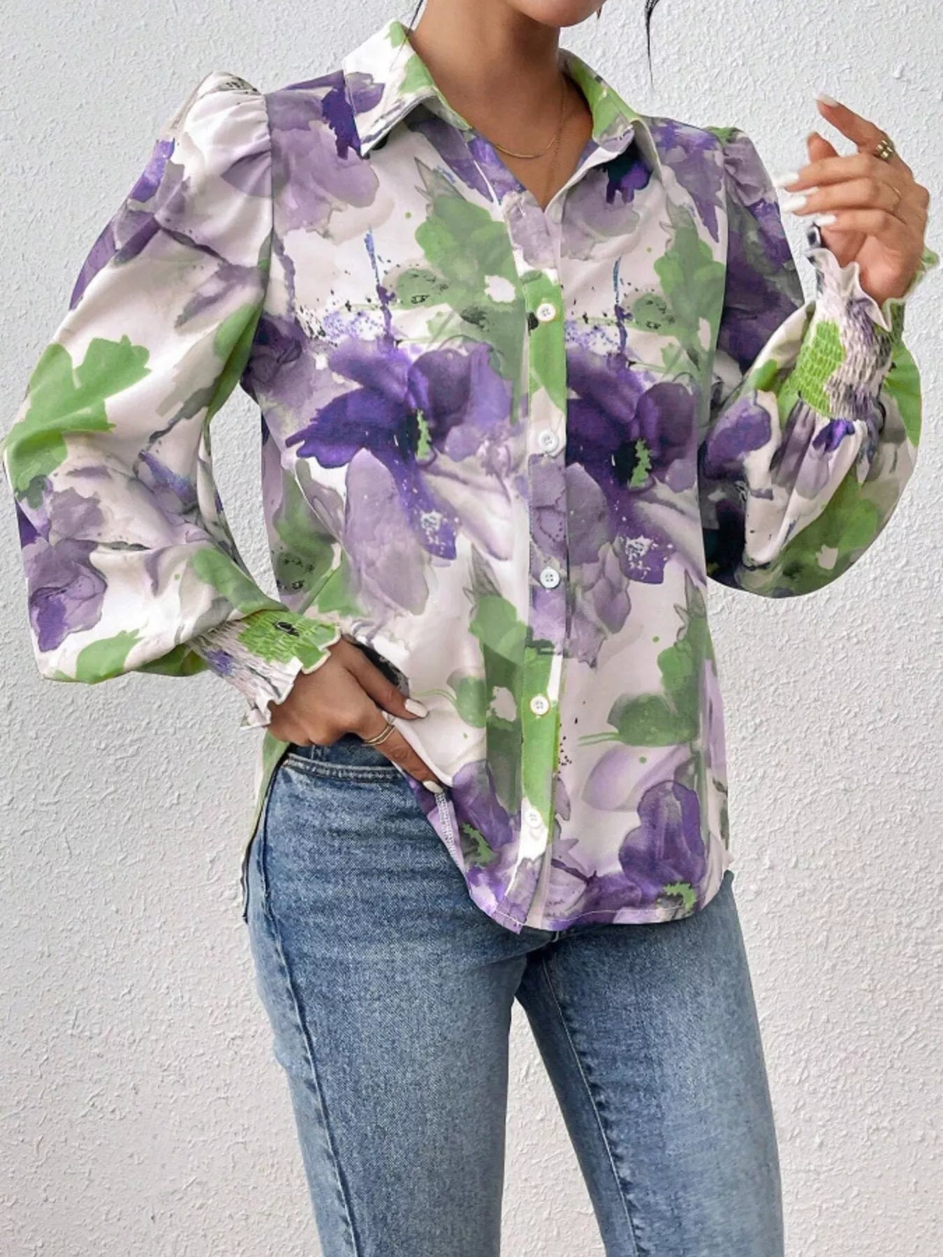 Printed button-up shirt with lantern sleeves in a polyester blend fabric.