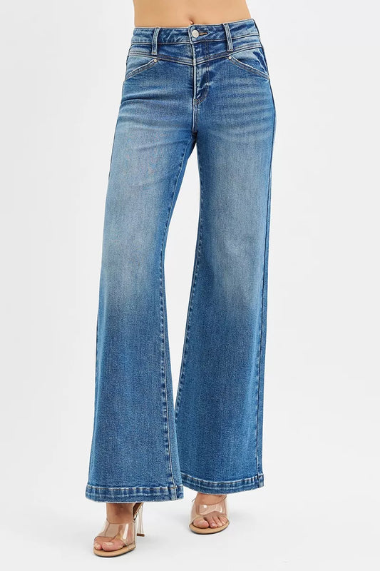 High-rise wide-leg jeans in light wash with heart-shaped back pockets, modeled on a figure.