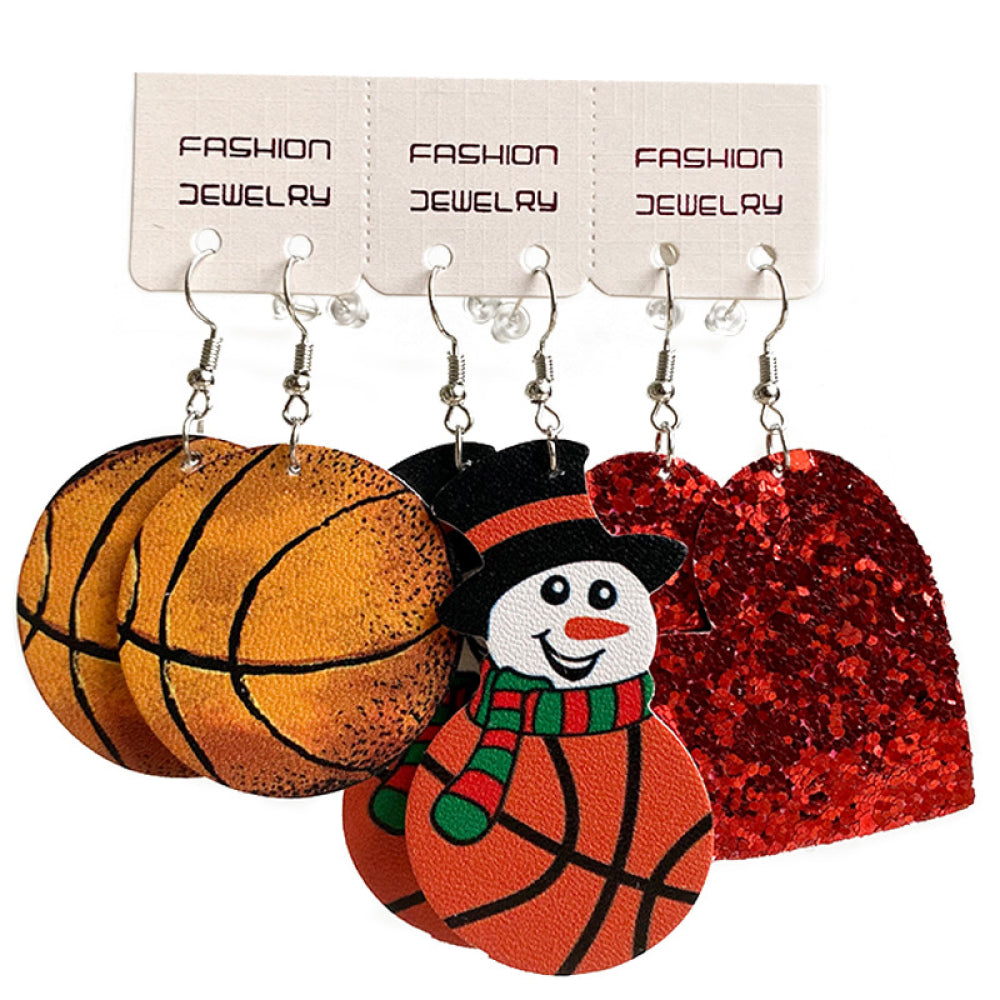 Set of iron charm earrings featuring snowman, basketball, and heart designs.