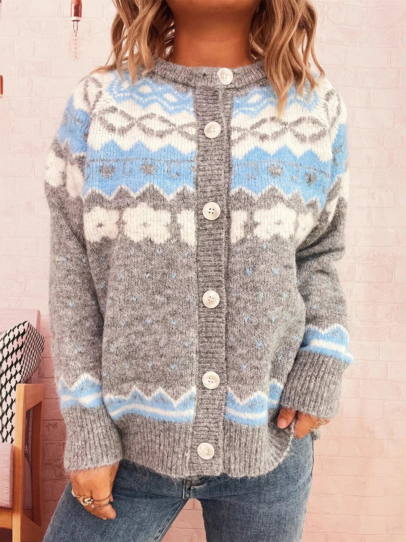 Ribbed button-down cardigan in stretchy 100% polyester with long sleeves and a relaxed fit.