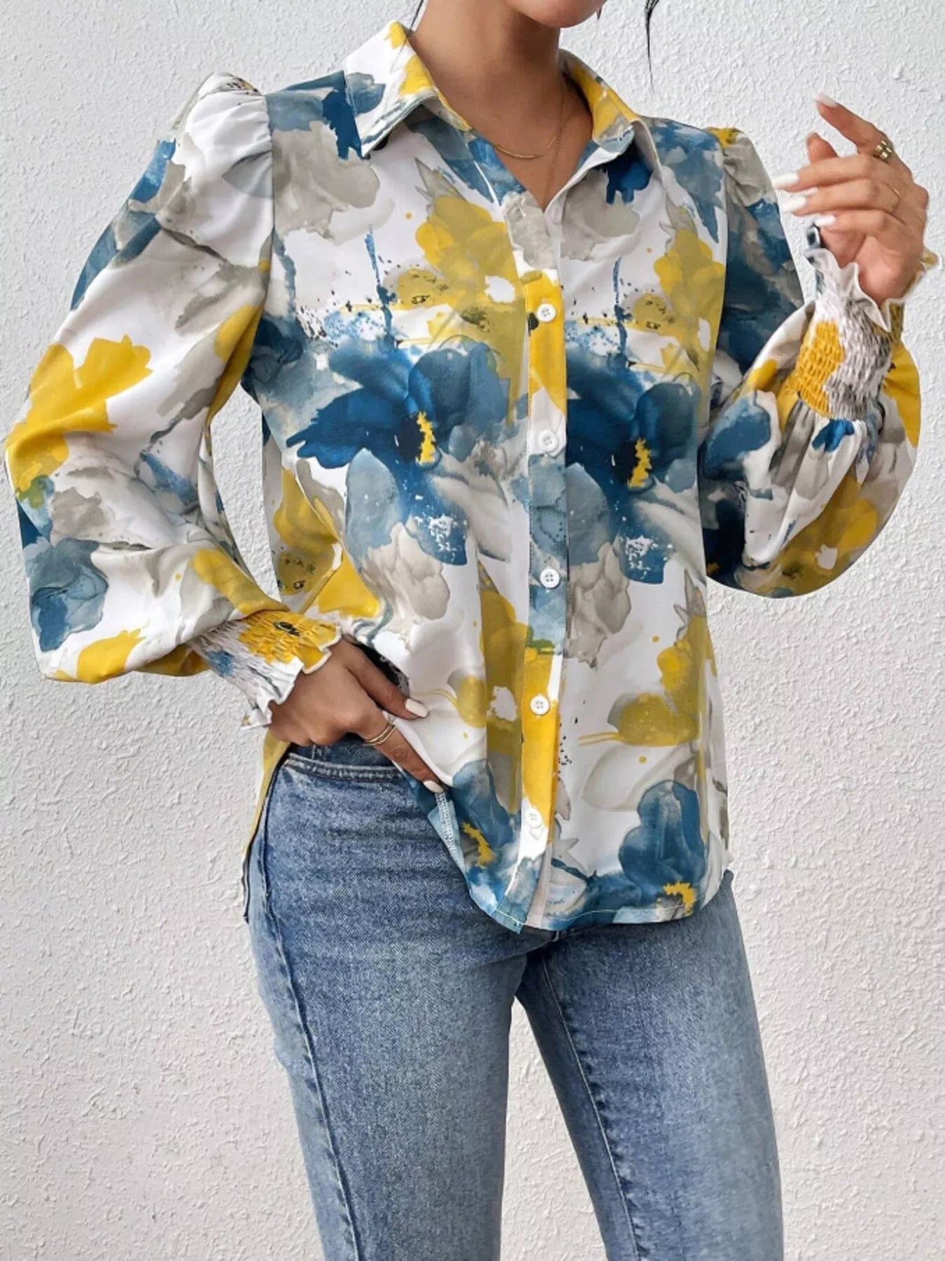 Printed button-up shirt with lantern sleeves in a polyester blend fabric.
