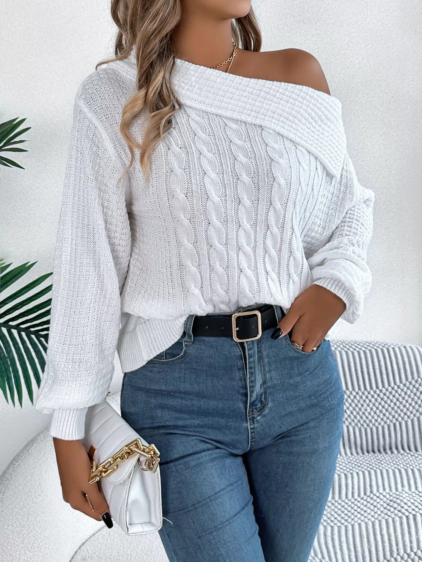 Off-shoulder cable knit sweater in soft, slightly stretchy acrylic with a classic texture.