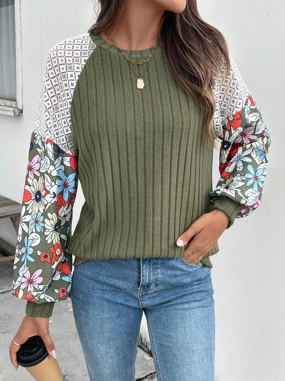 Long sleeve round neck knit top in a polyester blend with a basic style and moderate stretch.