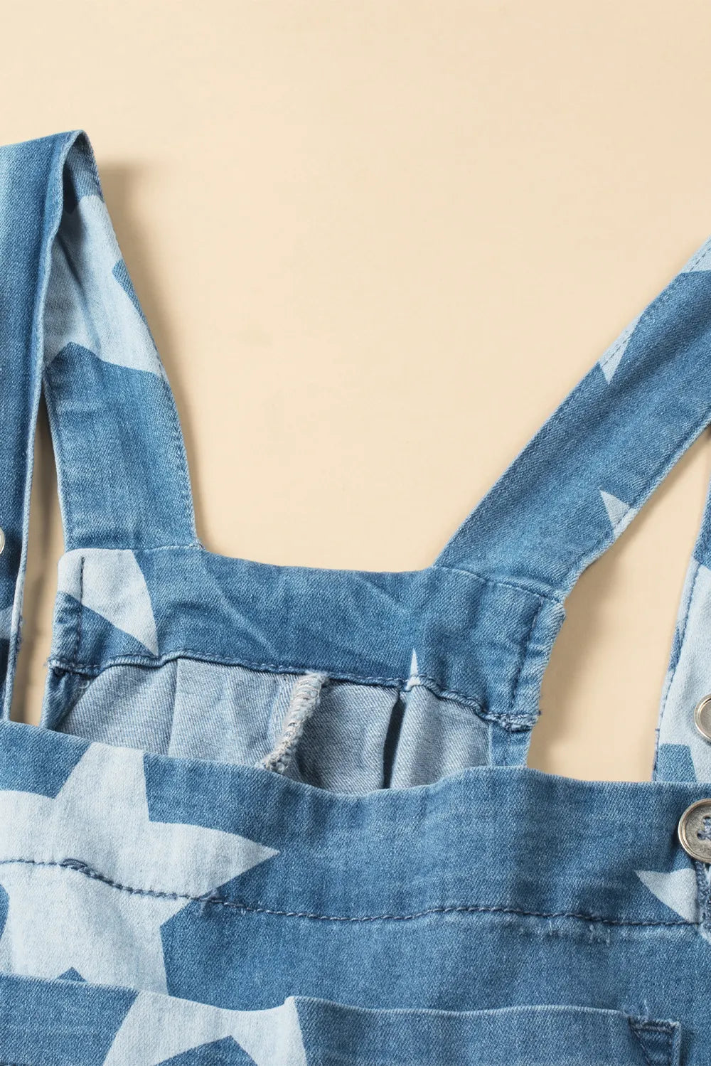 Wide leg denim overalls with star print and front pockets in cotton blend fabric