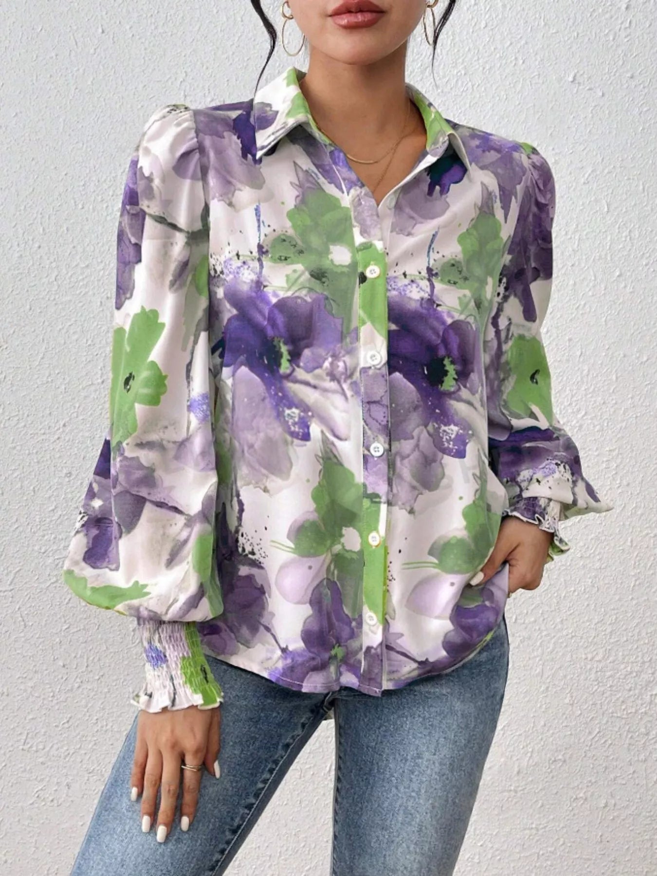 Printed button-up shirt with lantern sleeves in a polyester blend fabric.