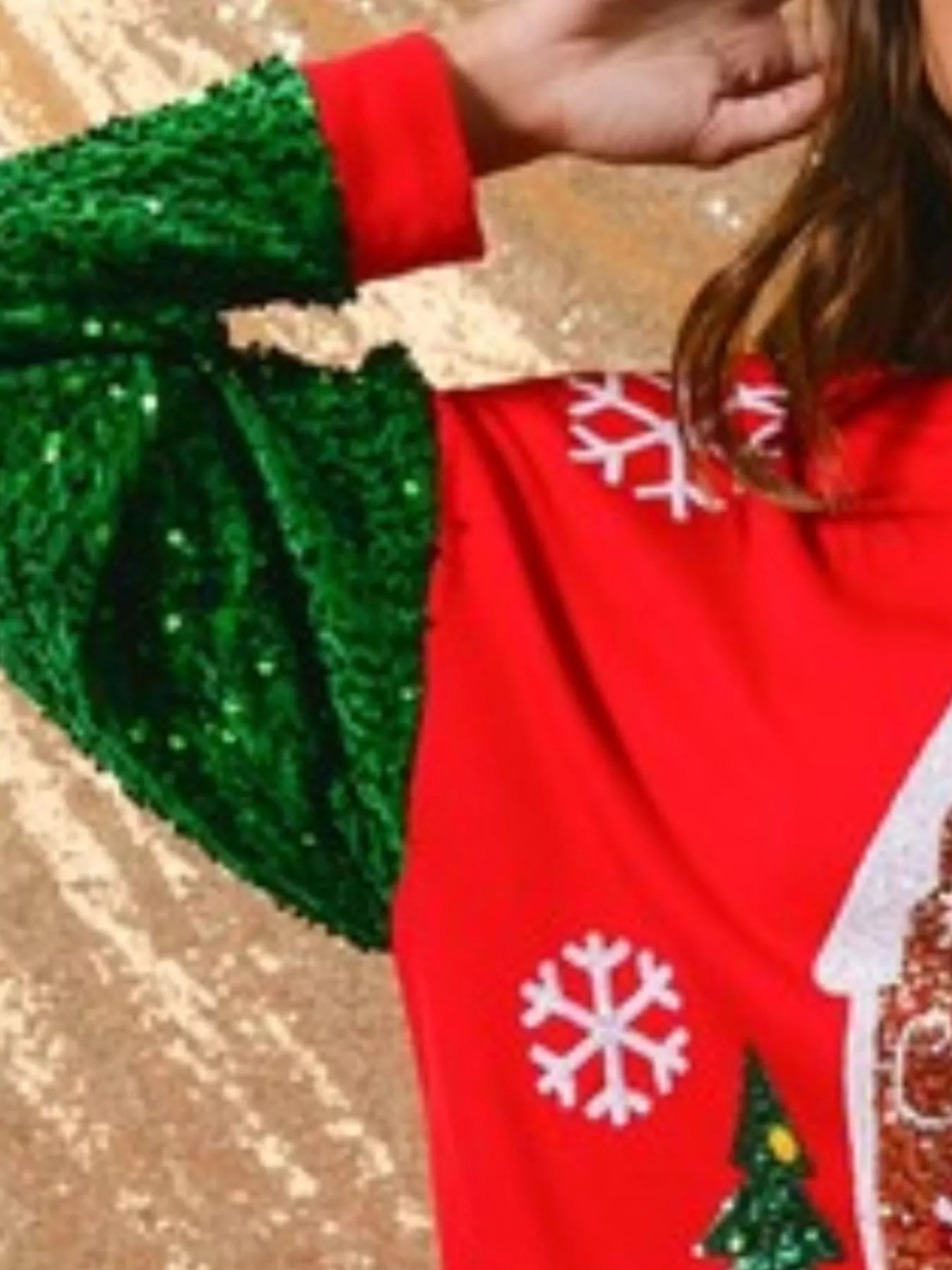 Long sleeve sweatshirt with sequins, designed for comfort and festive style.