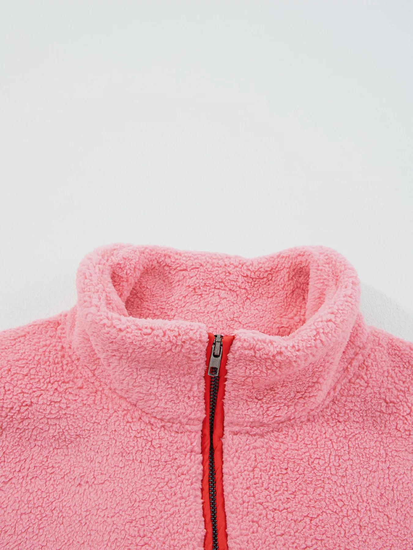 Faux leather trimmed half zip sweatshirt in cozy Sherpa fabric with front pocket.