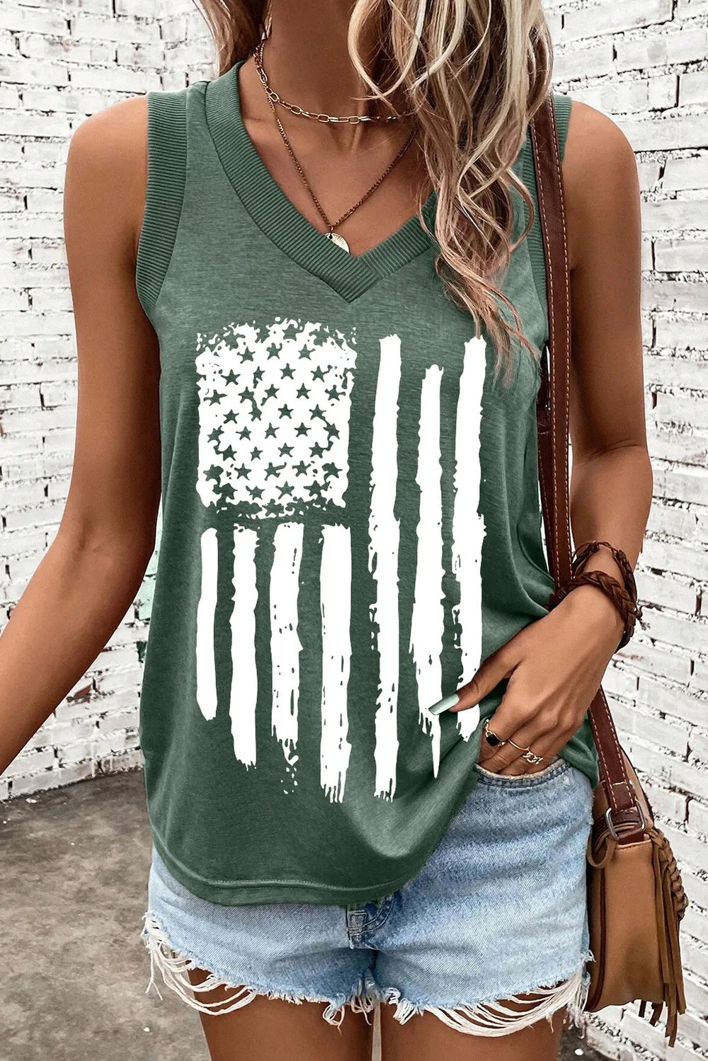 Sleeveless US flag V-neck tank top in polyester blend with slight stretch, opaque fabric