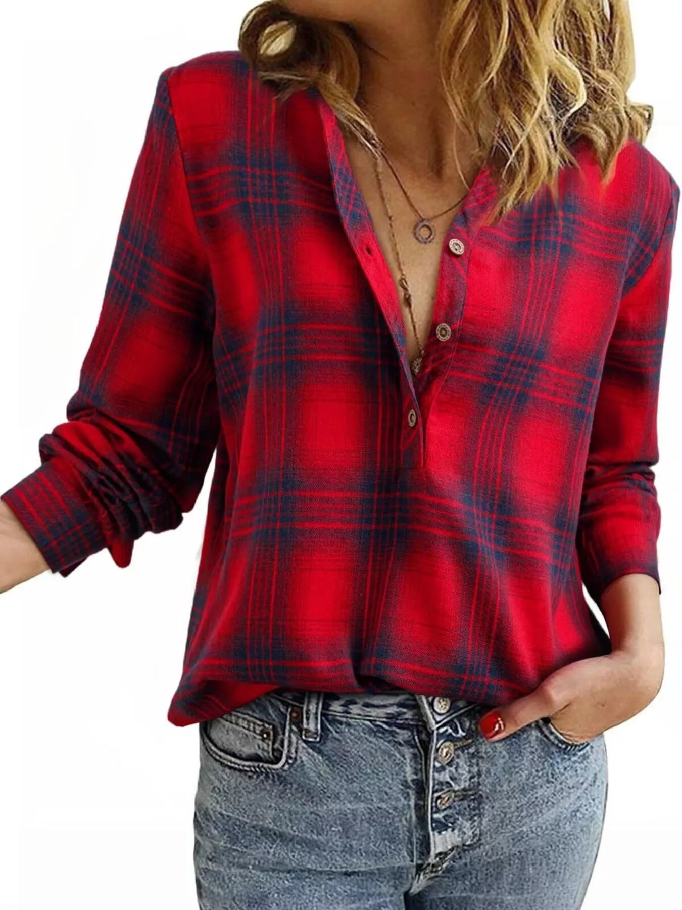 Plaid long sleeve blouse with half button front, made of polyester and spandex blend.