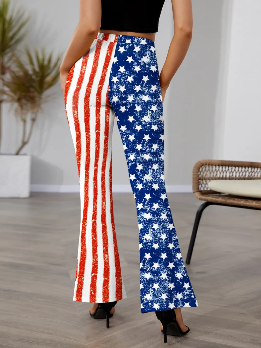 High waist bootcut pants with a star and stripes pattern in opaque fabric.