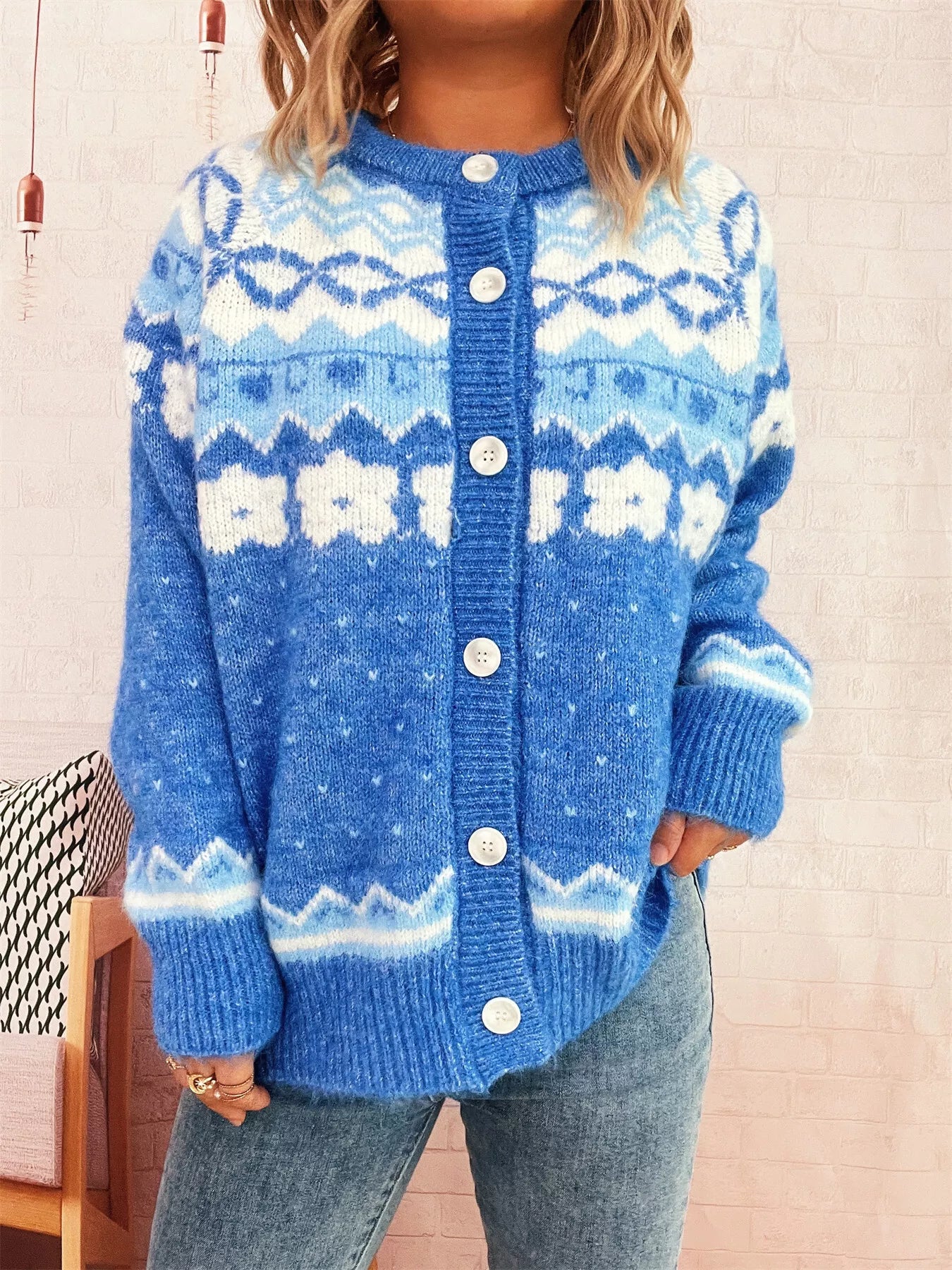 Ribbed button-down cardigan in stretchy polyester with long sleeves and a relaxed fit.