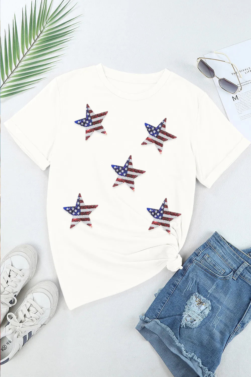 Sheer short sleeve t-shirt with sequin star design and round neck in a stretch fabric blend.