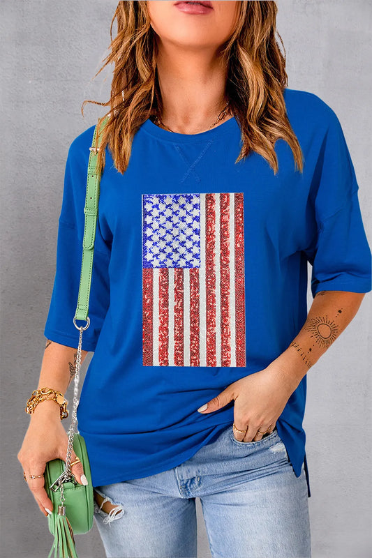 White t-shirt with US flag design, round neck, and half sleeves made from cotton blend.