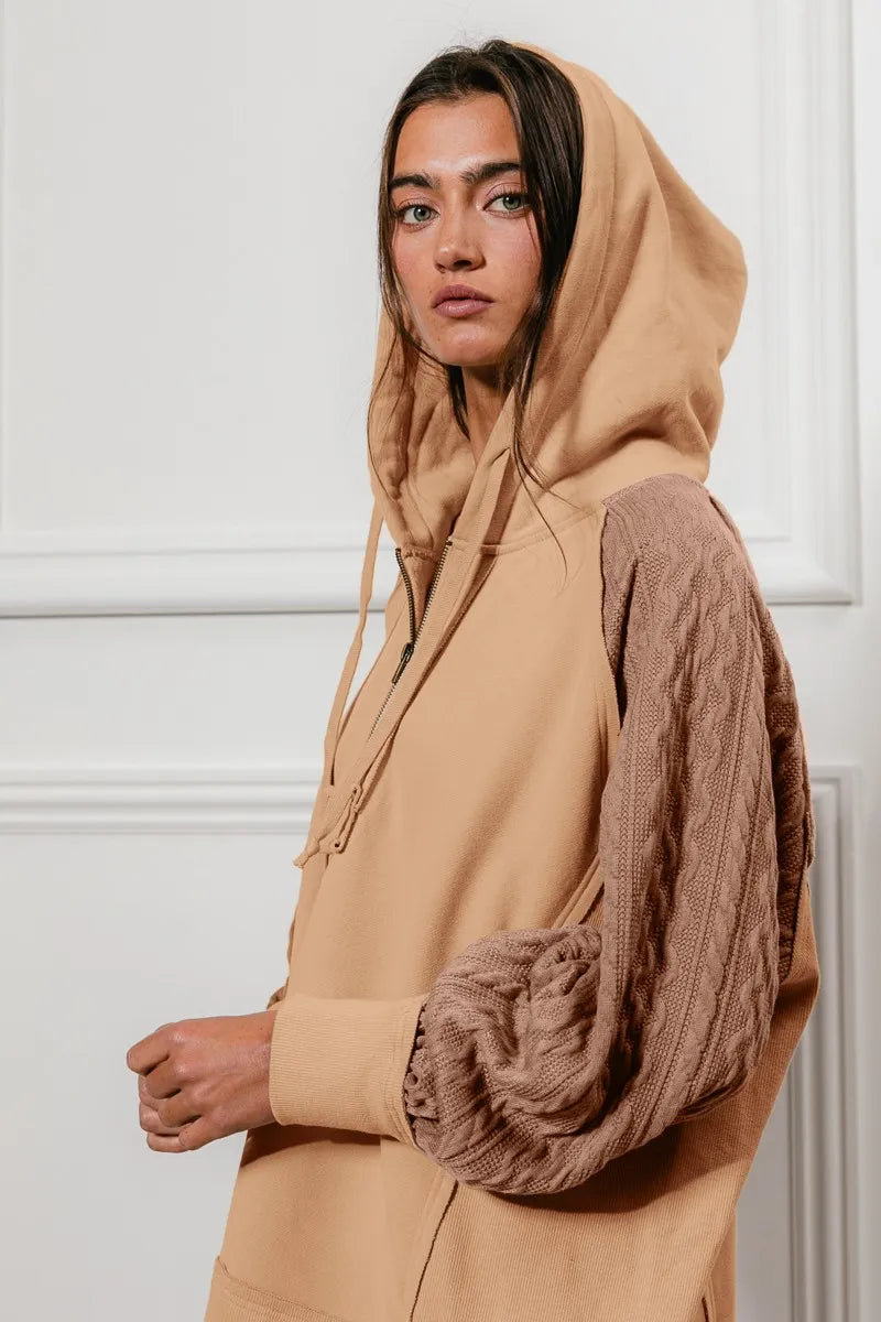 BiBi Half Zip French Terry Hoodie with knit sleeves, modeled on a woman.