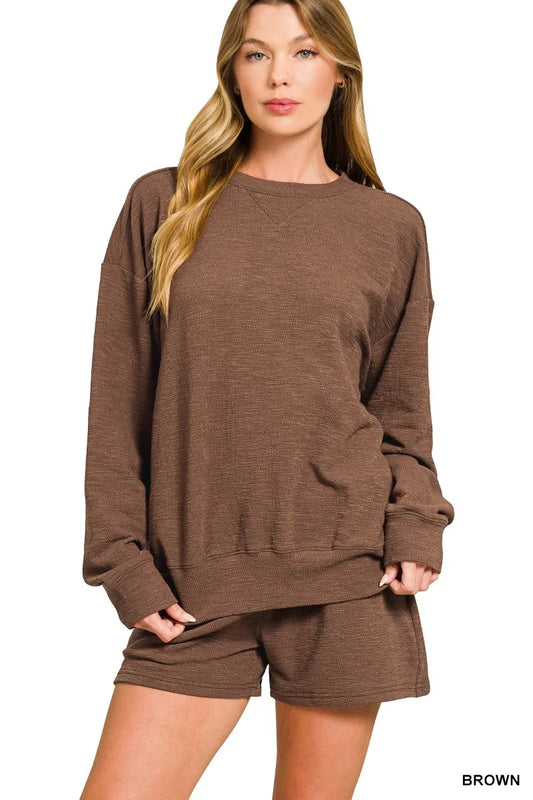 Woman modeling Zenana brown slub long sleeve top and shorts set.