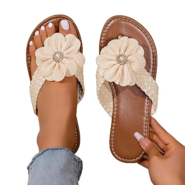 Bohemian brown leather toe post sandals with white fabric flowers and turquoise beads.