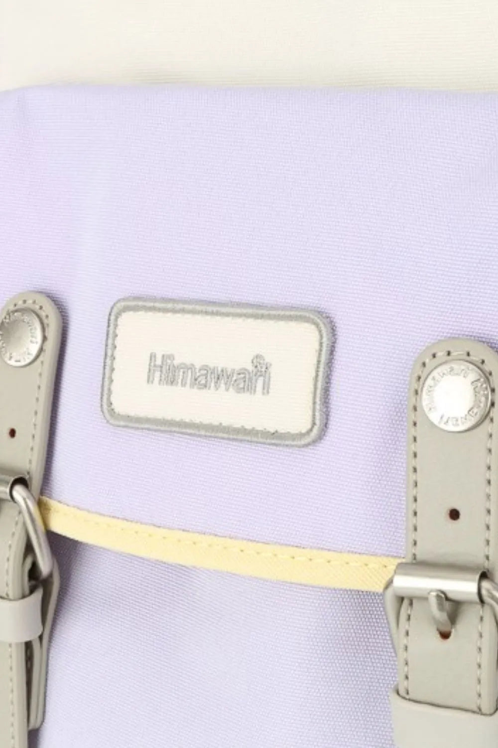 Lilac Himawari water-resistant nylon backpack with contrast details and Himawari label.