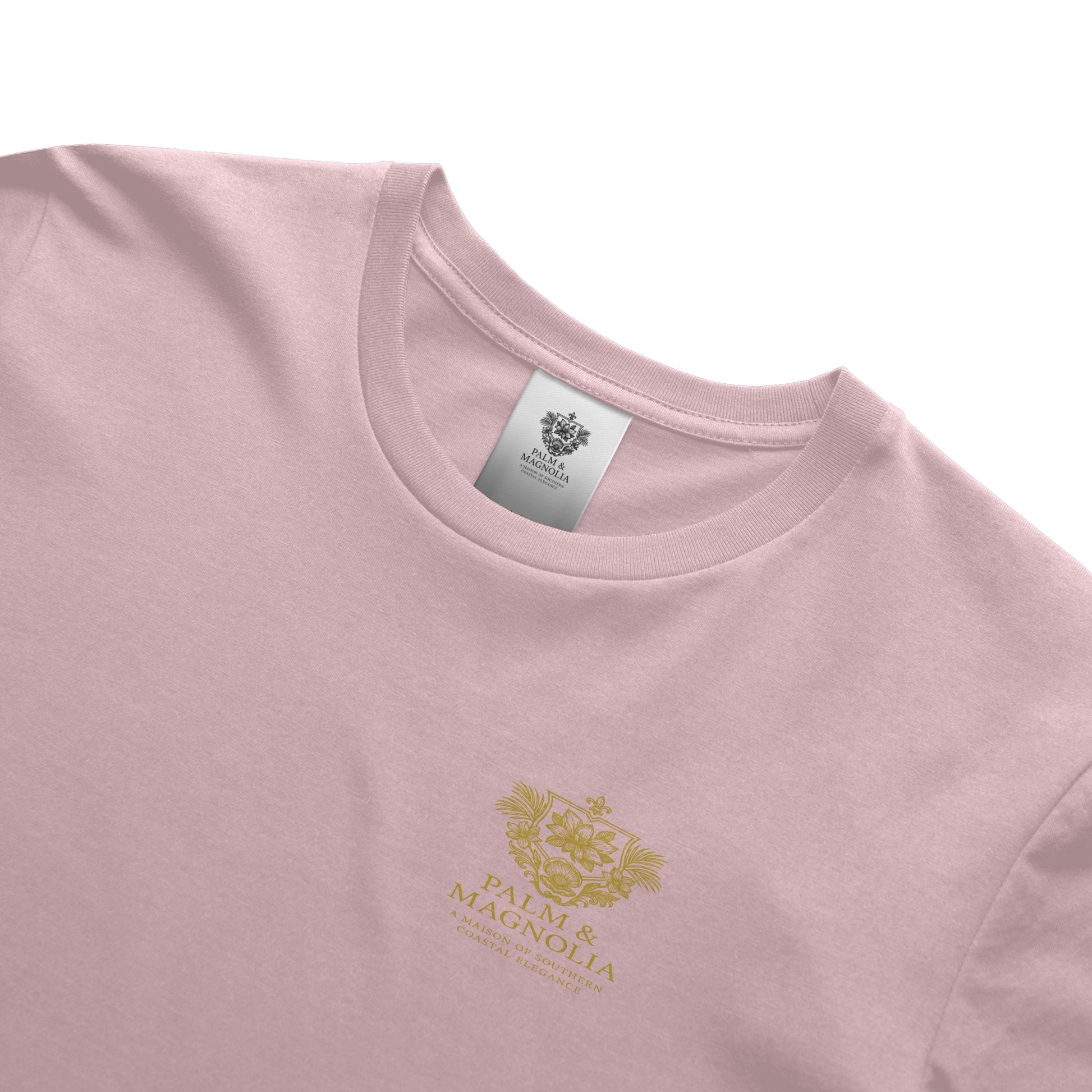 Pink unisex ring-spun cotton tee with gold Palm & Magnolia crest logo.
