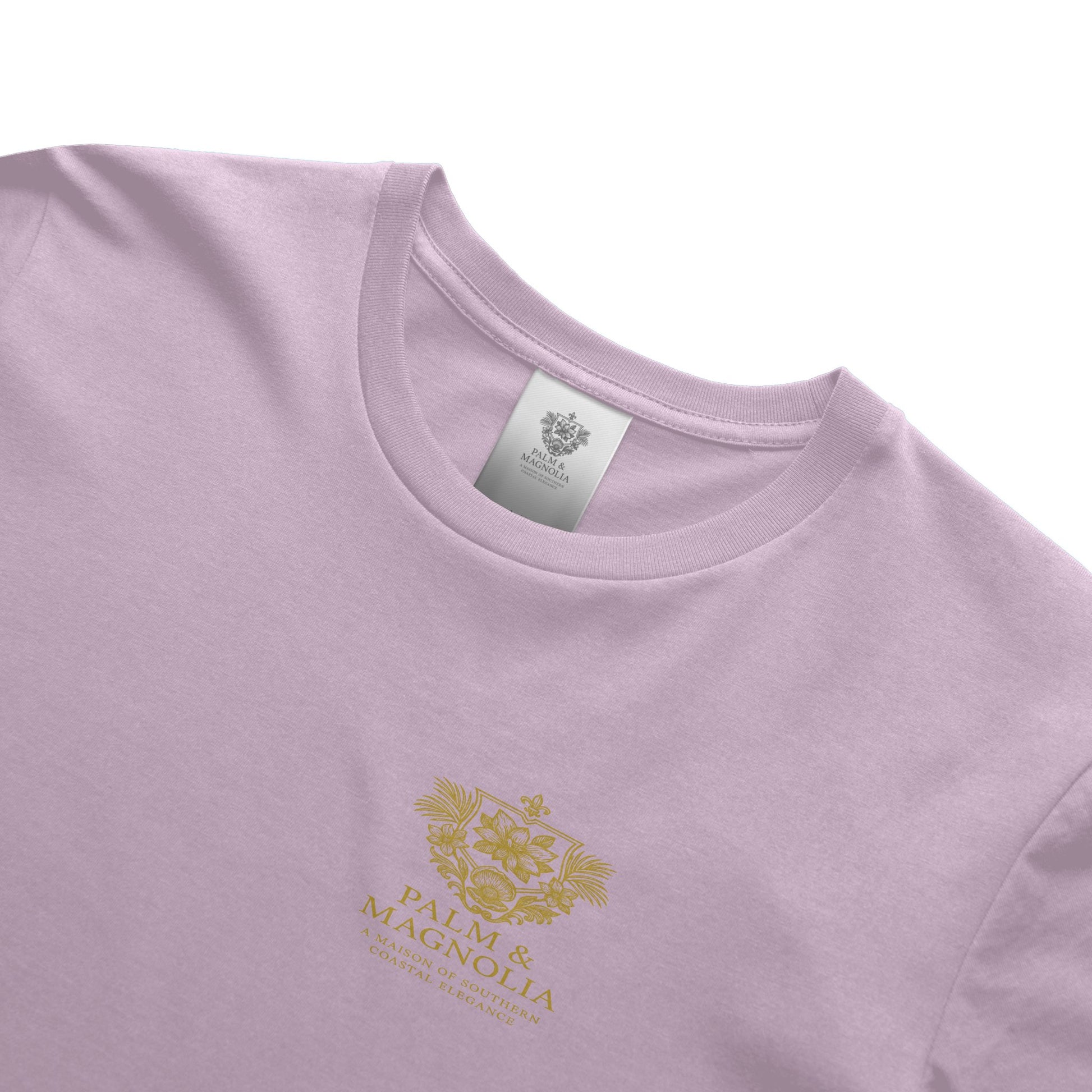 Light pink unisex ring-spun cotton tee with gold Palm & Magnolia crest.