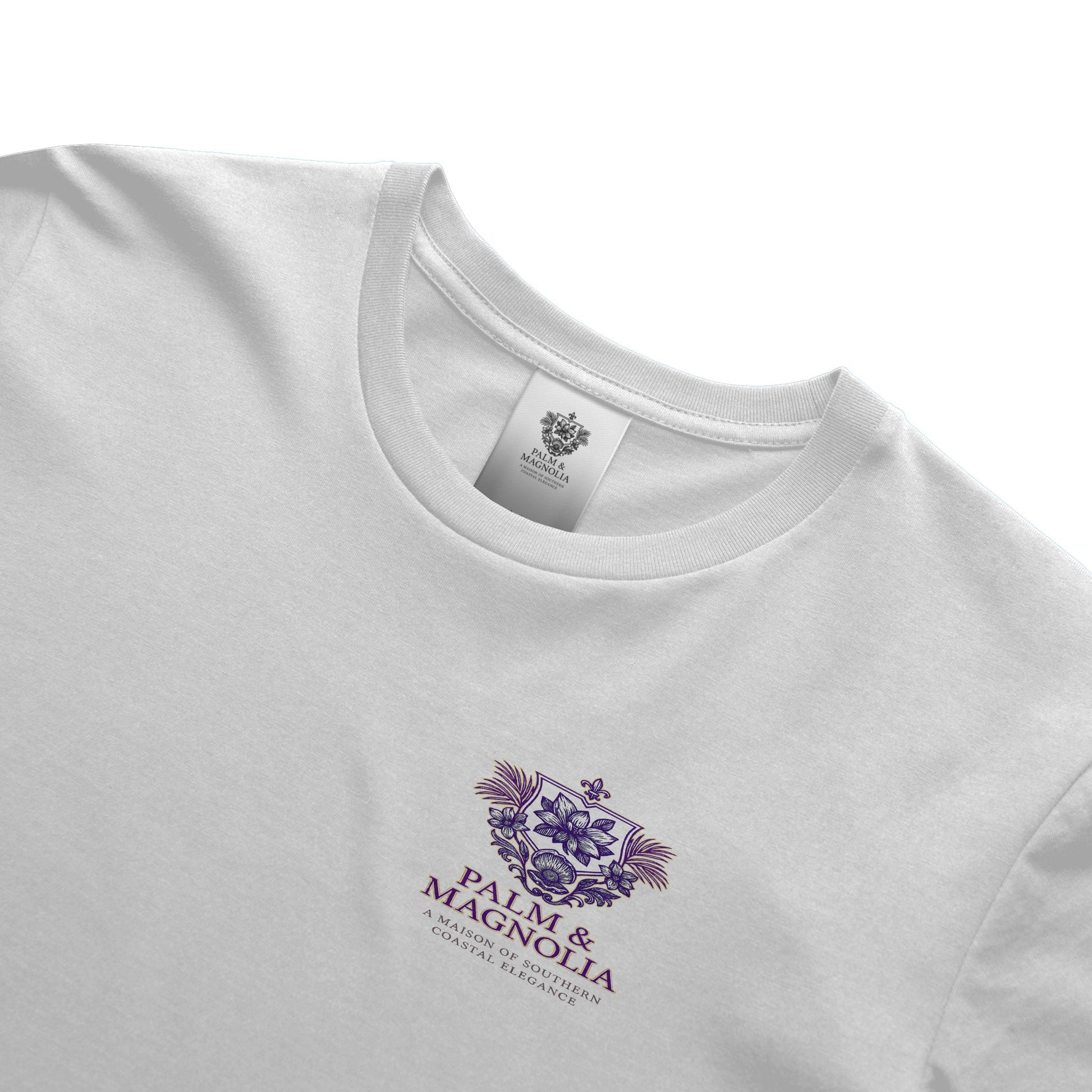 White ring-spun cotton tee with purple Palm & Magnolia crest and poodle design.