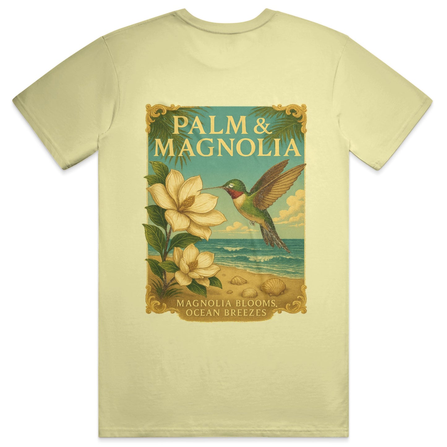 Yellow Comfort Colors T-shirt with vintage-style print of hummingbird, magnolia blooms, palm leaves, beach, and ocean.