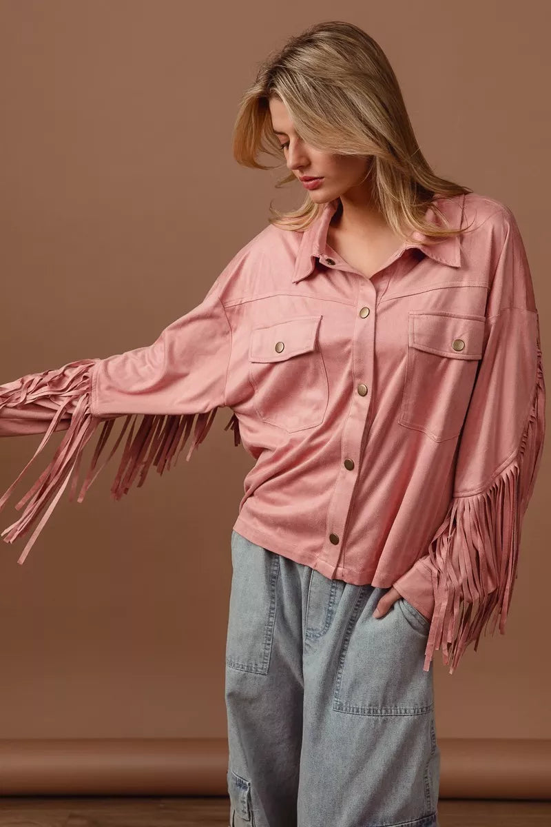 BiBi suede fringe long sleeve jacket in pink on a model.