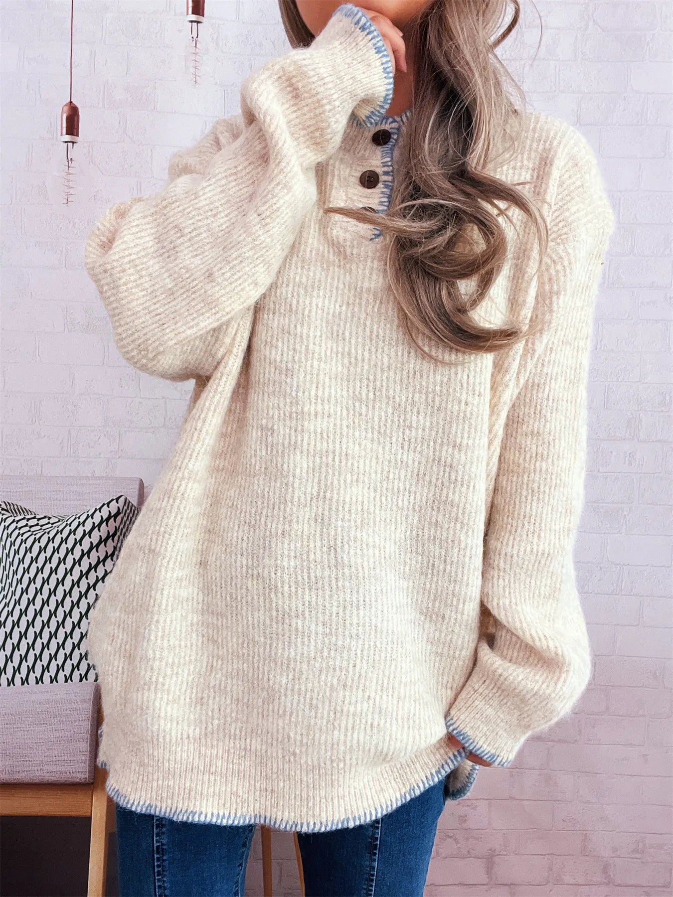 Oversized ribbed long sleeve sweater with button details and contrast stitching in polyester