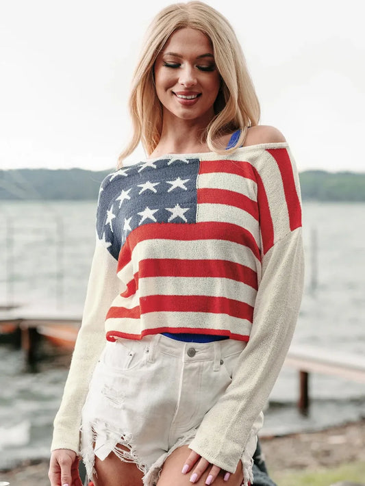 Long sleeve boat neck top with US flag design, made of 100% acrylic.