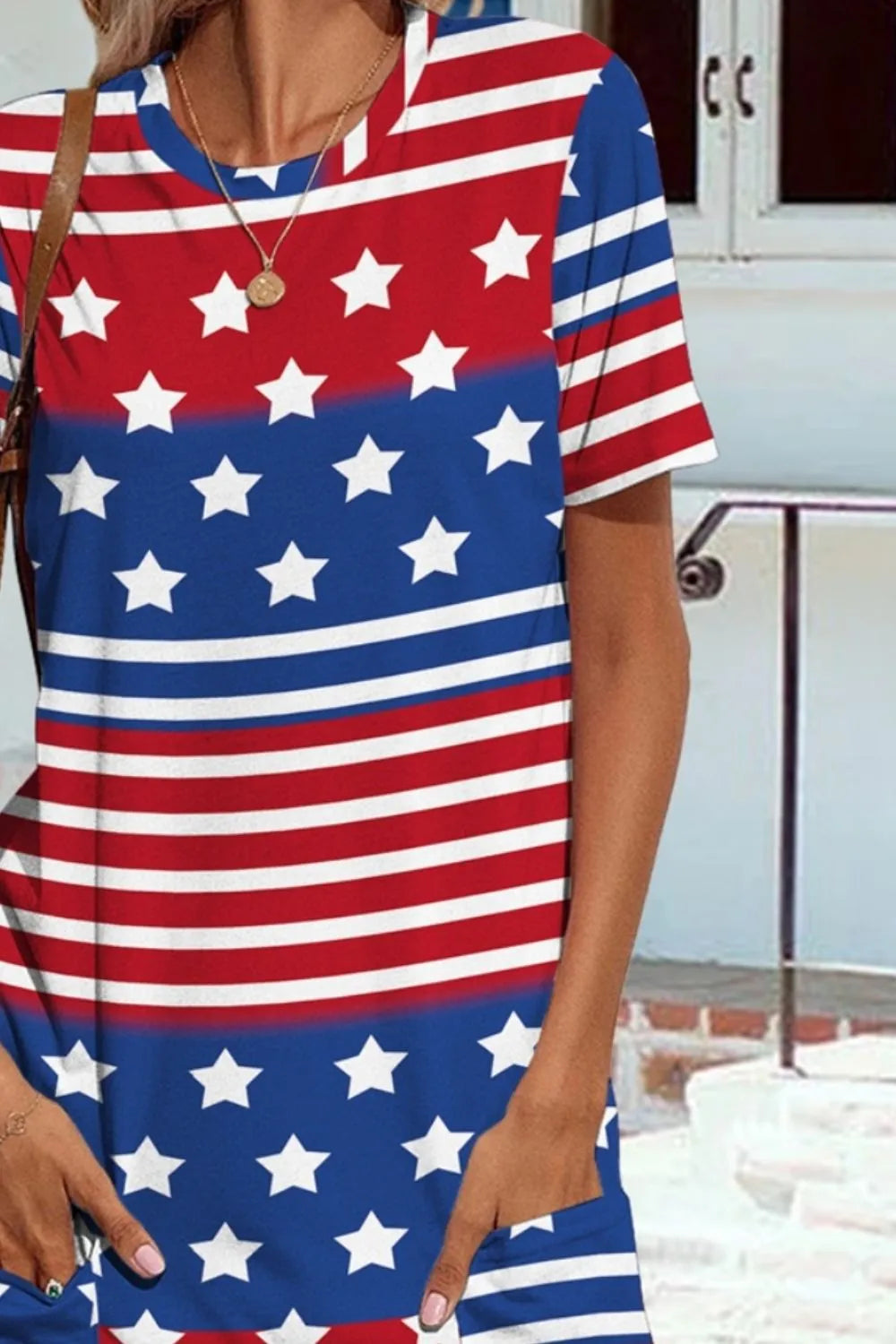 Short sleeve dress with US flag print, sheer pockets, and slightly stretchy fabric