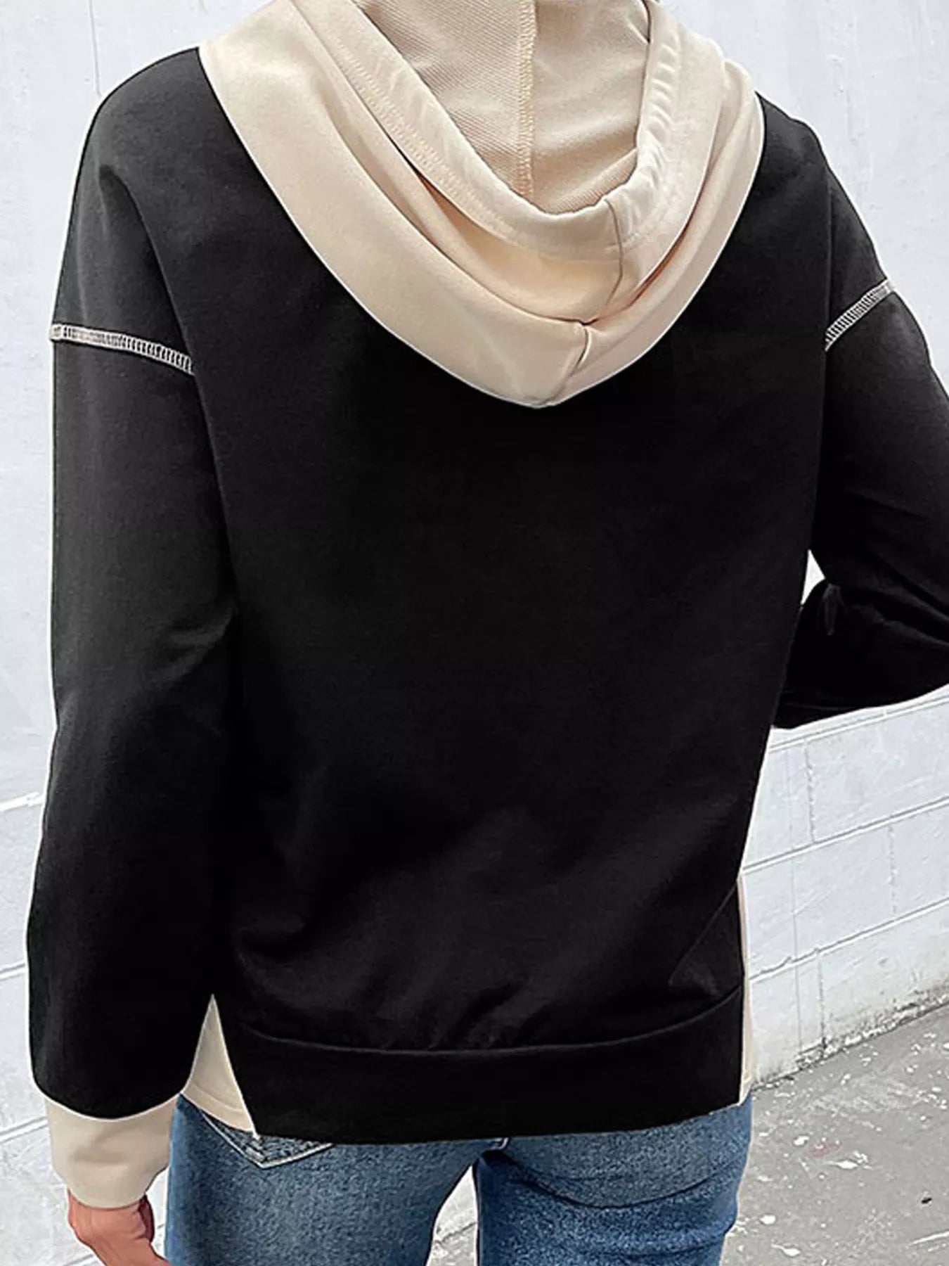 Color block hoodie with drawstring hood and kangaroo pocket in a soft polyester cotton blend.