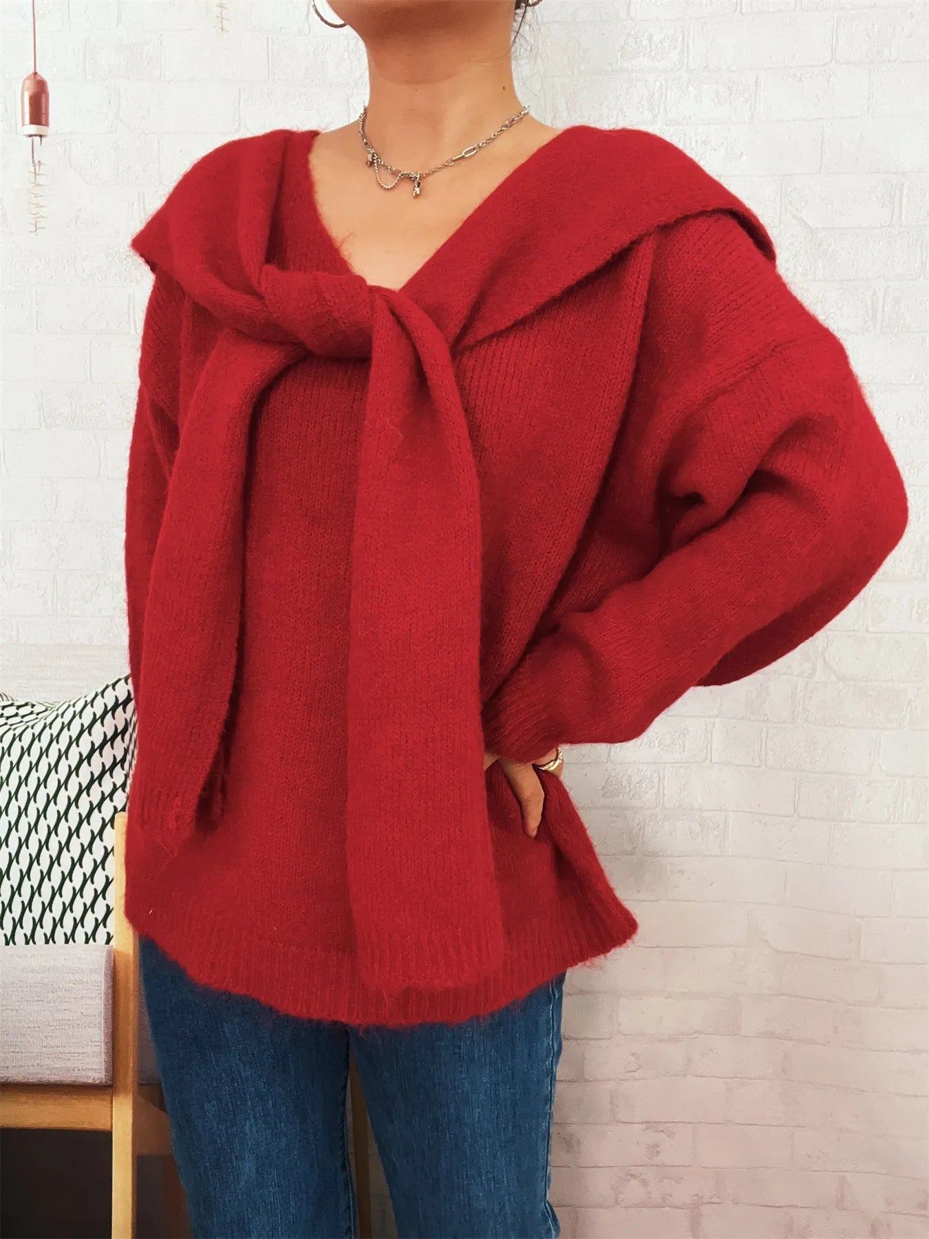 Ribbed hem V-neck sweater with shawl in a basic style and slightly stretchy fabric.