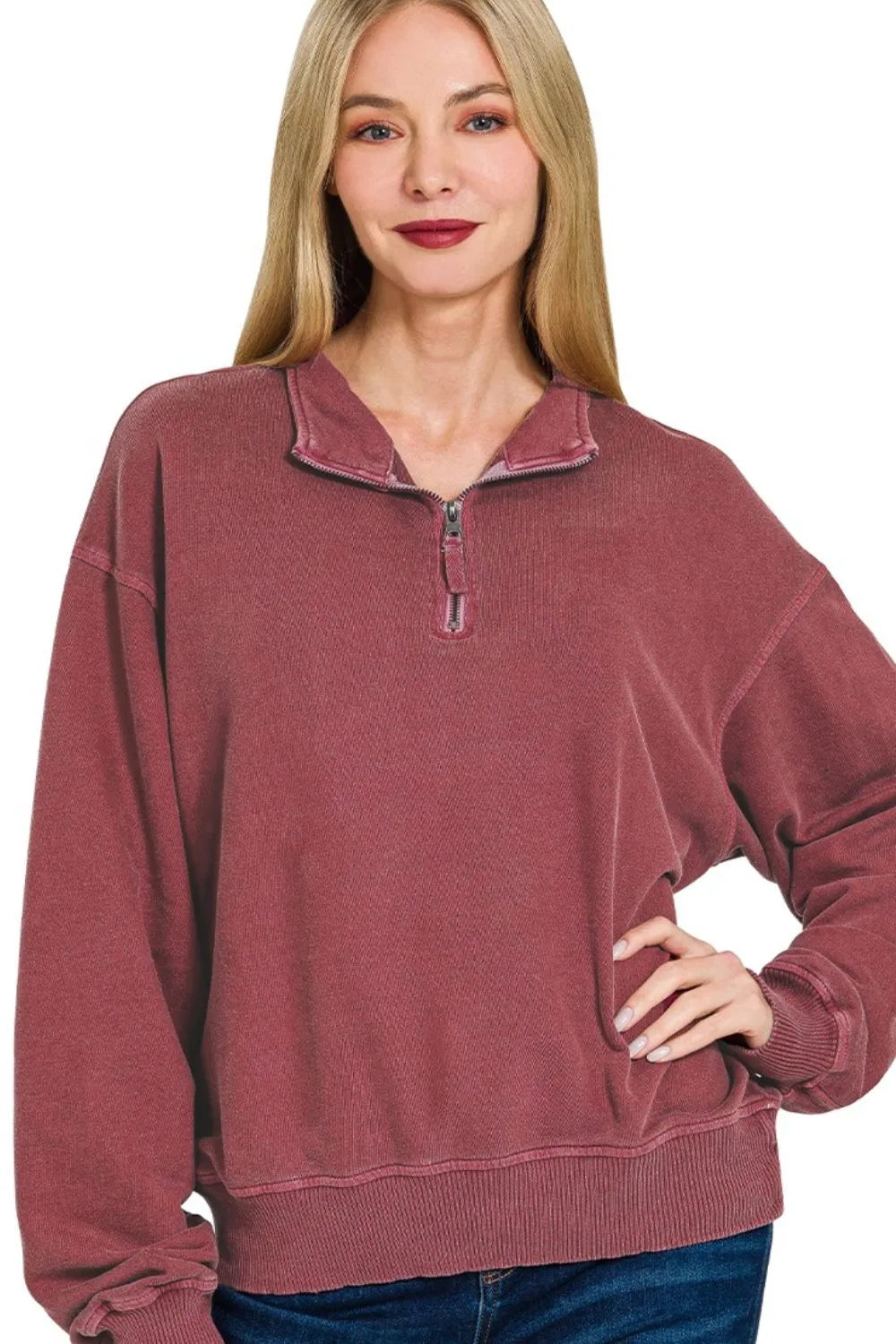 Dusty rose quarter-zip cotton fleece pullover with relaxed fit and drop shoulders.